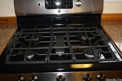 New 5 burner gas range