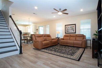 A spacious, open-concept den & kitchen that seamlessly flows together.