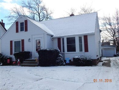 Paved Driveway And One And A Half Car Garage