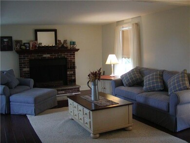 Living Room. Living room features newer wood look 