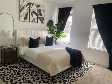 Bedroom featuring carpet