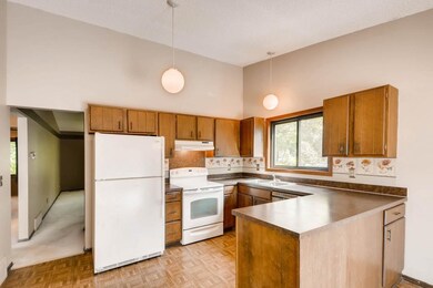 The kitchen is large and offers plenty of cabinet 