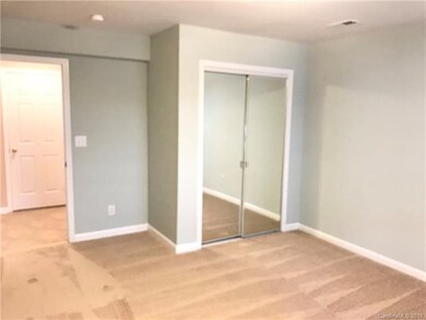 Downstairs bedroom, closet with sliding mirror doo