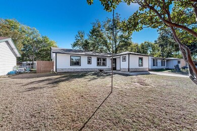 Ranch-style house featuring a front yard