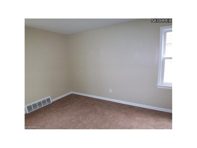 One of two bedrooms on the first floor--newer carp