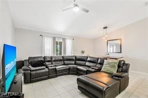 Living room featuring ceiling fan and lofted ceili