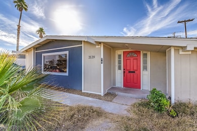 View of exterior entry featuring stucco siding