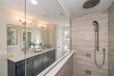Master Bath with Double Bowl Vanities and Custom S