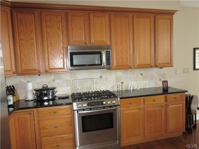 lots of kitchen cabinets with new appliance.  Note