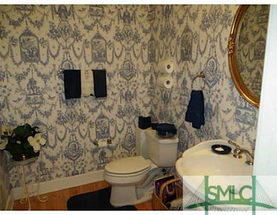 Bathroom. Gorgeous downstairs powder room is taste
