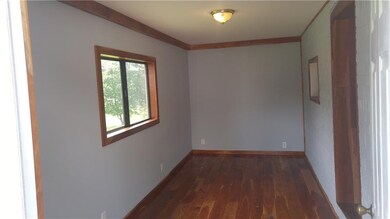 Enclosed porch/entryway from side door with view t