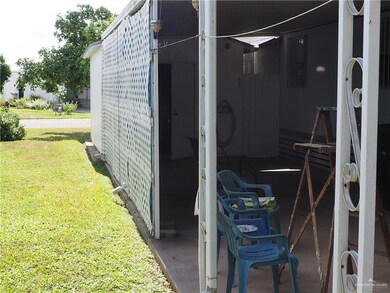 East side of Mobile Home with carport