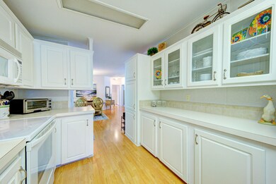 kitchen with glass front cabinets