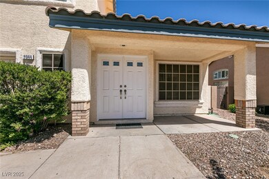 Doorway to property with stucco siding