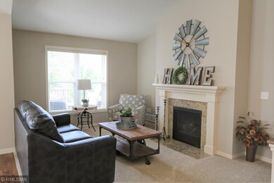 Living room with gas fireplace.