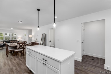 Island provides additional storage and counter space