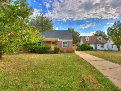 View of front of house featuring a front lawn