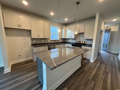 Kitchen with appliances with stainless steel finis
