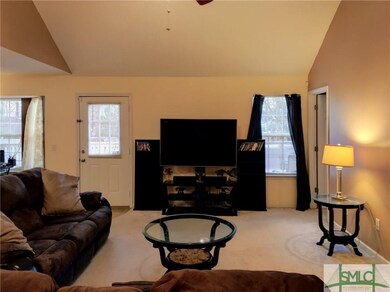 Large living room with vaulted ceilings and a ceil