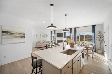 Kitchen with island and pendant lighting