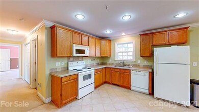 Spacious kitchen with dining area