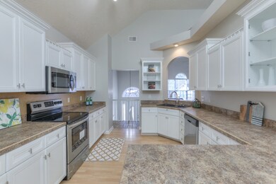 Massive kitchen with stainless steel appliances