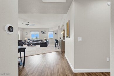 Hall featuring baseboards and wood finished floors