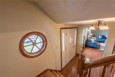 The Spacious Entry/Foyer measures 9x6, has a Nice 