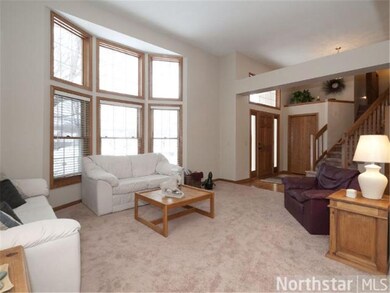 High ceilings grace the formal main living room wi