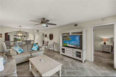 7025 Dennis Cir unit 104, Naples, FL 34104 - photo 6