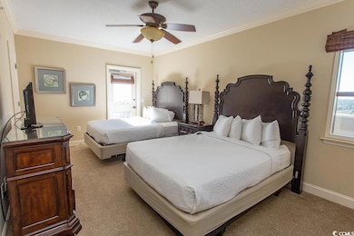Bedroom featuring light carpet, crown molding, cei