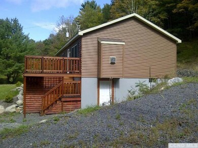Right Side showing basement entrance.