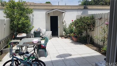Tiled private rear yard/patio