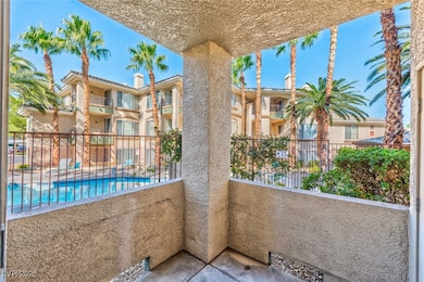 Balcony with view of pool