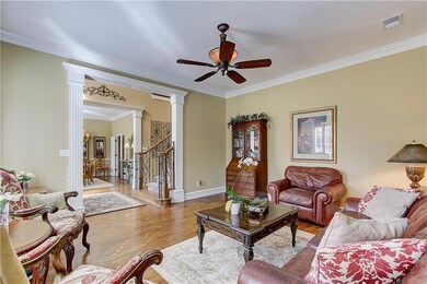 Ceiling fan, hardwood floors.