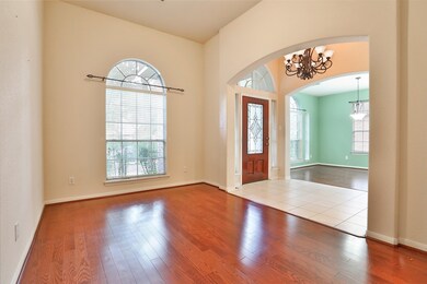 This home welcomes you with a spacious foyer that leads to both a formal dining room and a formal living room. This area could also be used as a home office or a play area.