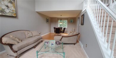 Formal living room is painted a soft grey.