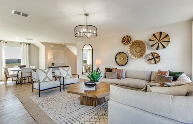 Sunlit gathering room designed for relaxation and entertainment *Model representation
