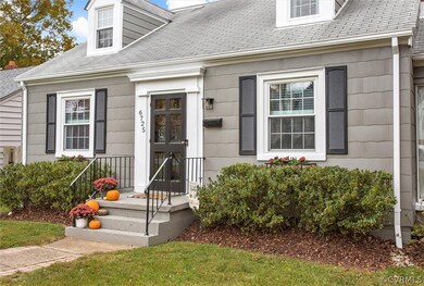 Freshly painted exterior and cheerful window boxes welcomes you home!