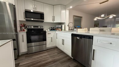 3910 Inverrary Blvd unit B503, Lauderhill, FL 33319 - photo 2