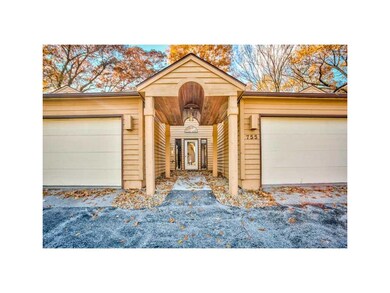 Front Exterior. QUIET CONDO WITH WOODED VIEW.