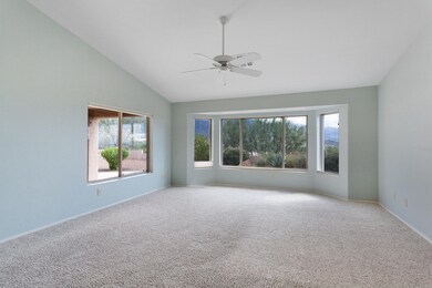 Master bedroom with bay window.