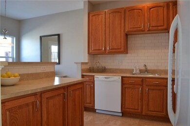 Kitchen Island opens to living and dining room as 