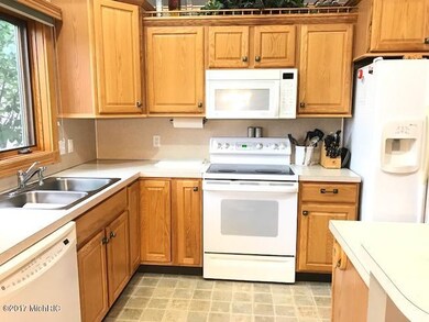 2155 Creekside Dr SW unit 43, Byron Center, MI 49315 - photo 4