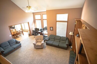 Great room with fireplace and built in shelves