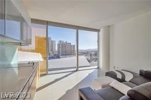 Living room featuring a wall of windows