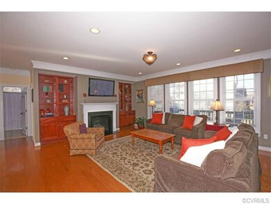 Additional view family room. Note windows and cust