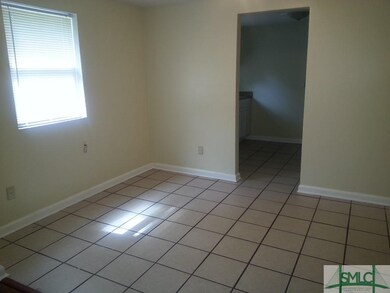 Formal Dining Room Between Living Room and Kitchen