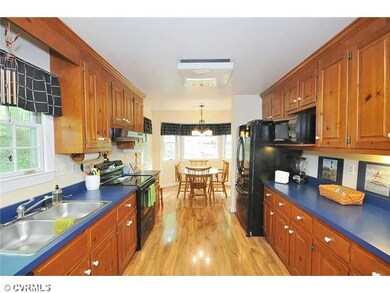 Kitchen - Large eat-in kitchen with new floor and 