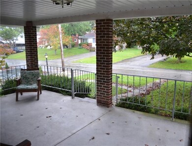 The huge 12X23 covered front porch offers a peaceful retreat to enjoy your morning coffee, or a glass of wine at the end of a long day....